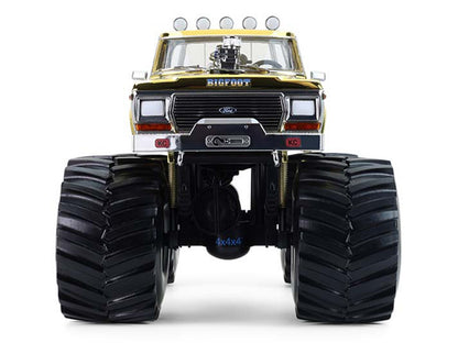 1979 Ford F-250 Monster Truck "Bigfoot #1 50th Anniversary" Gold Chrome with Bob Chandler Standing Figure "Kings of Crunch" Series 1/18 Diecast Model Car by Greenlight